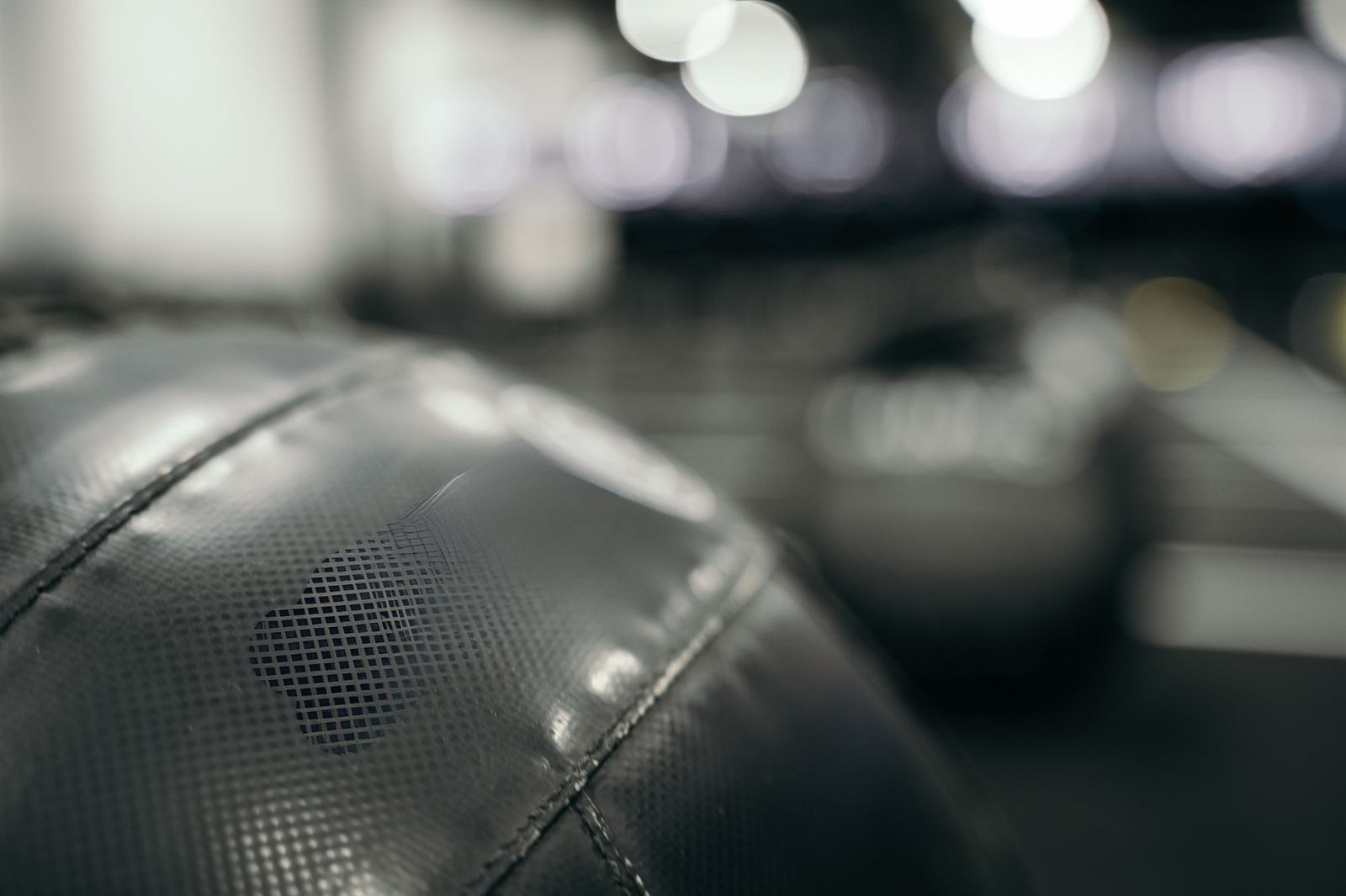 Close-up of a wall ball with the race floor behind it